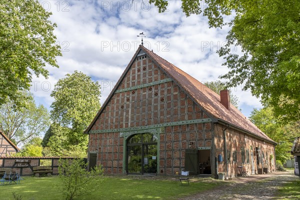 Half-timbered house in the round village of Satemin