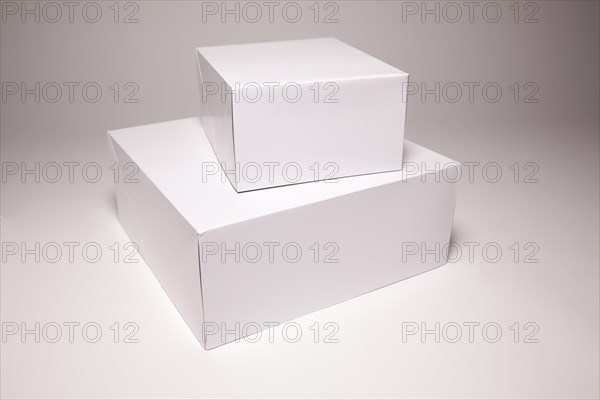 Blank white box isolated on a grey background ready for your own graphics