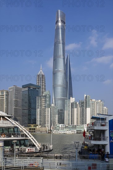 View over the Huangpu River to the skyline of the special economic zone Pudong with the skyscrapers Jin Mao Tower