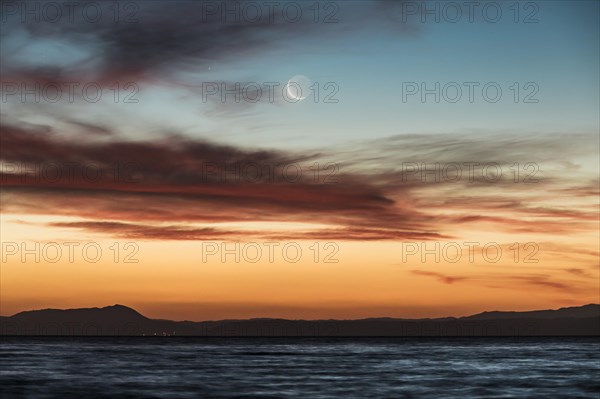 Moon at sunset at Lake Taupo