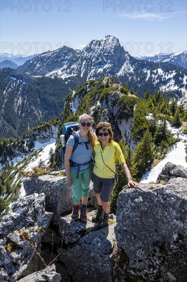 Two female hikers on the summit of Breitenstein