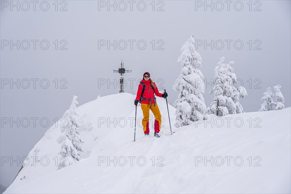 Young woman on ski tour