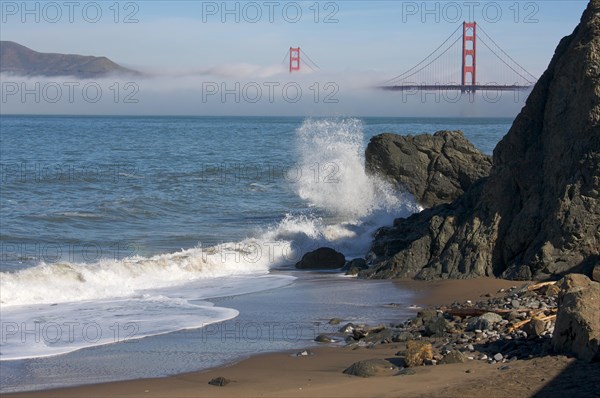 The golden gate bridge in the early morning fog. san francisco