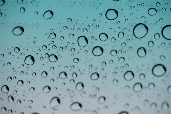 Close up shot of water drops on glass