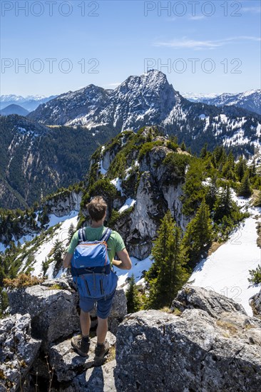 Hiker on the summit of Breitenstein