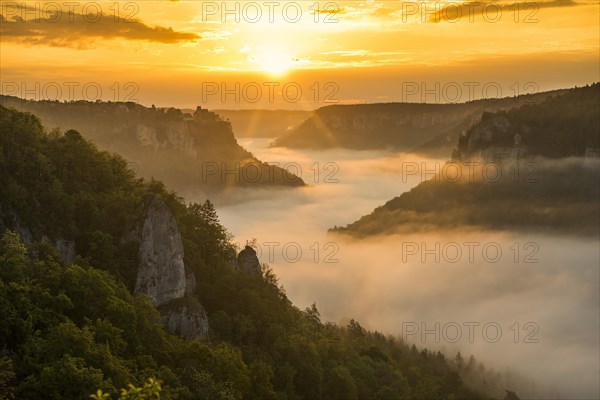 View from Eichfelsen to Werenwag Castle with morning fog