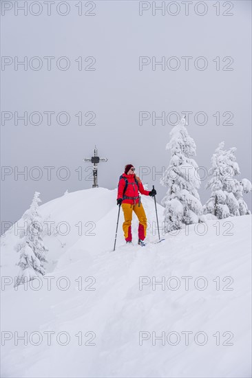 Young woman on ski tour