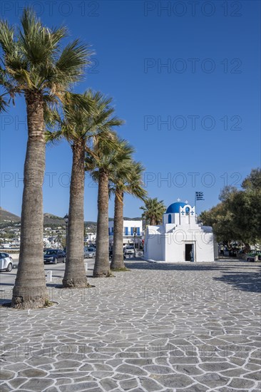 Blue and White Greek Orthodox Church Agios Nikolaos with Greek Flag