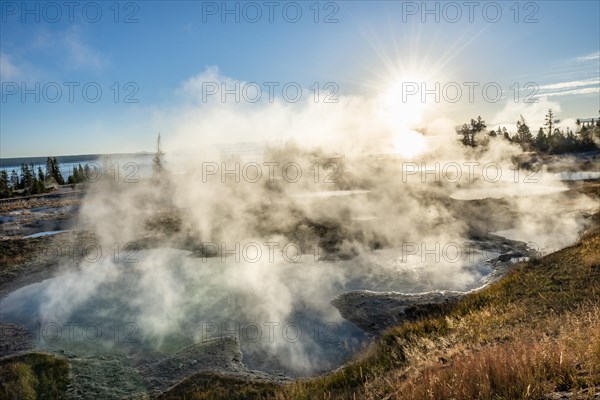 View of steaming hot springs in the morning sun