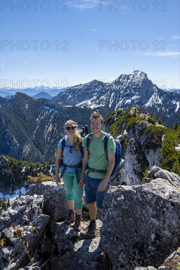 Two hikers on the summit of Breitenstein