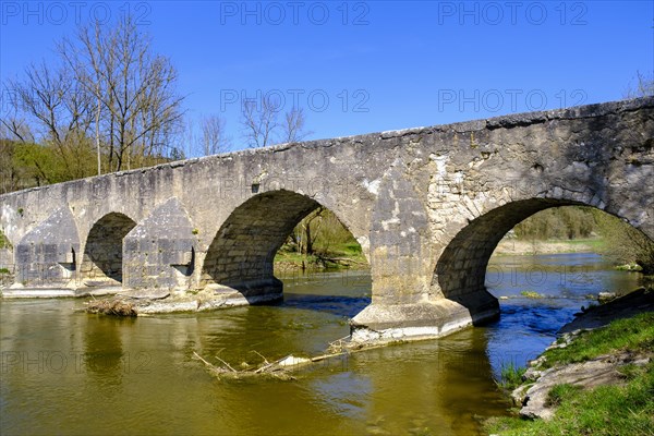 Roman bridge over the Altmuehl in the Altmuehltal nature park near Pfuenz