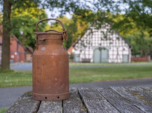 Old milk can in the village center of the Rundlingsdorf Luebeln