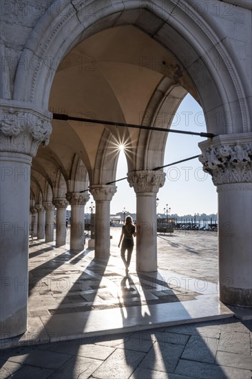 Sun shining through columns