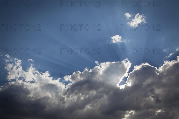 Beautiful dramatic storm clouds with silver lining and light rays with room for your own text or graphics