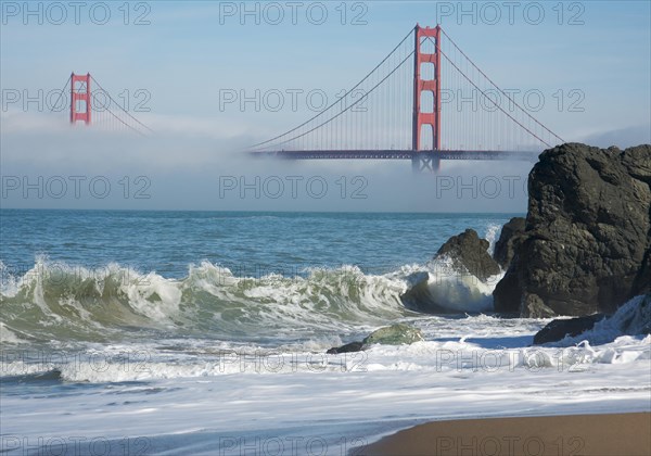 The beautiful golden gate bridge in the morning fog