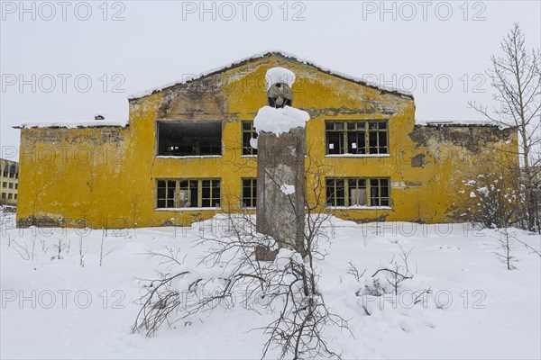Destroyed Lenin statue in the abandoned mining city Kadykchan