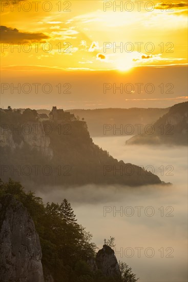 View from Eichfelsen to Werenwag Castle with morning fog