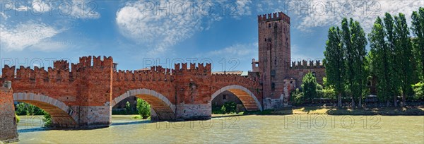 River Adige with the stone bridge Ponte Scaligero