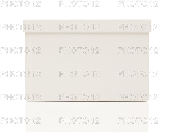 Blank white box with lid isolated on a white background ready for your own message
