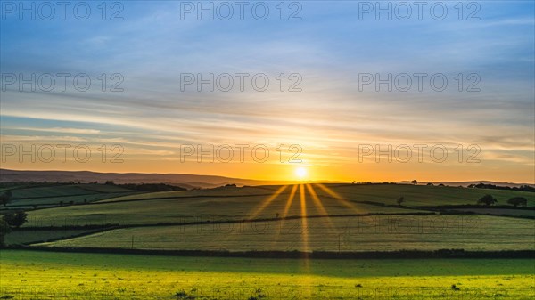 Sunset over fields in Berry Pomeroy Village