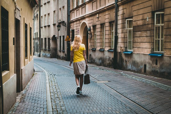 Woman in yellow t-shirt