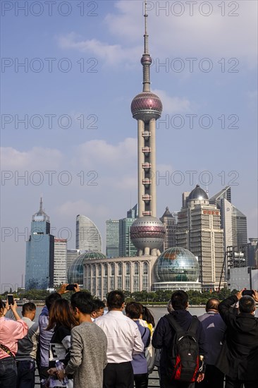 View from The Bund across the Huangpu River to the skyline of the Pudong Special Economic Zone with Oriental Pearl Tower