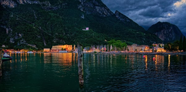 Colorfully lit harbor in the evening