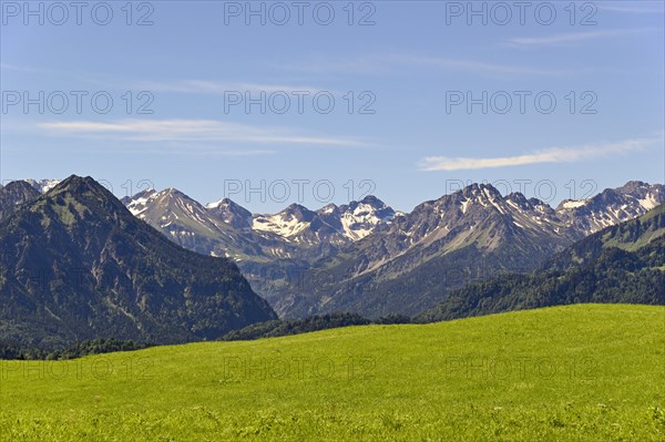 View from the meadows near the village Reichenbach to the mountain panorama of the Allgaeu Alps