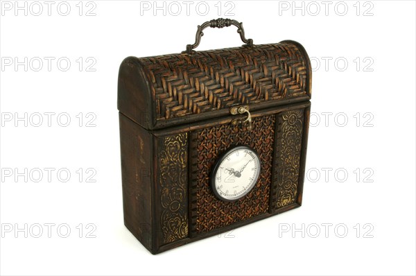 Ornate carriage clock box on a white background