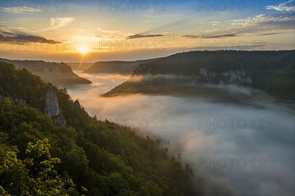 View from Eichfelsen to Werenwag Castle with morning fog