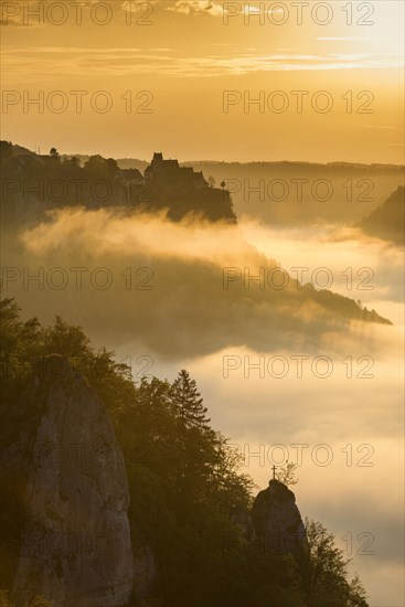 View from Eichfelsen to Werenwag Castle with morning fog