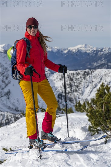 Young woman on ski tour