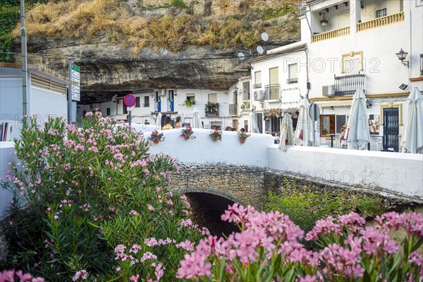 White washed houses built under the rock in Setenil de las Bodegas