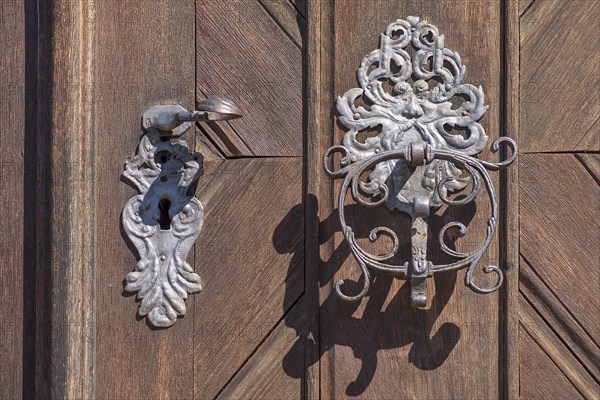 Door knocker at the entrance door to the castle building