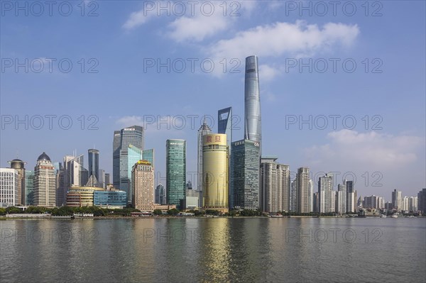 View over the Huangpu River to the skyline of the special economic zone Pudong with the skyscrapers Jin MaoTower