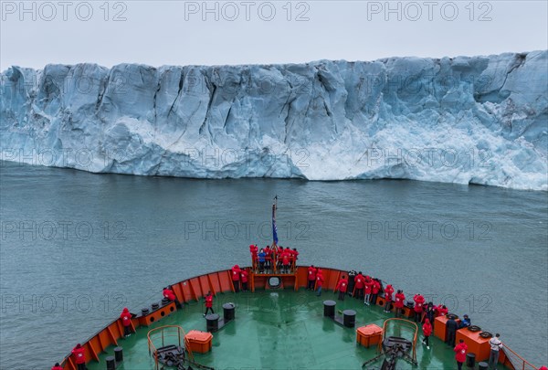 Icebreaker apporaching a massive glacier on Mc Clintok or Klintok Island