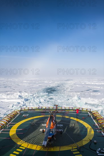 Fog bow or white rainbow in the ice around the North Pole