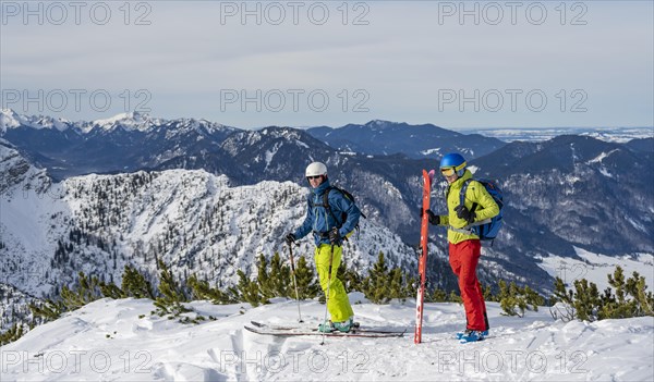 Two ski tourers at the summit of Simetsberg