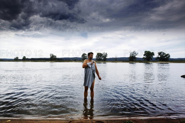 Man bathing in Elbe