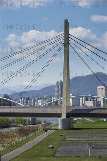 Massive bridge spanning across the Ishikari river flowing through Sapporo