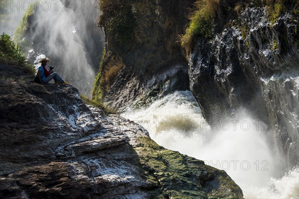 Man sitting on top of the Murchison Falls