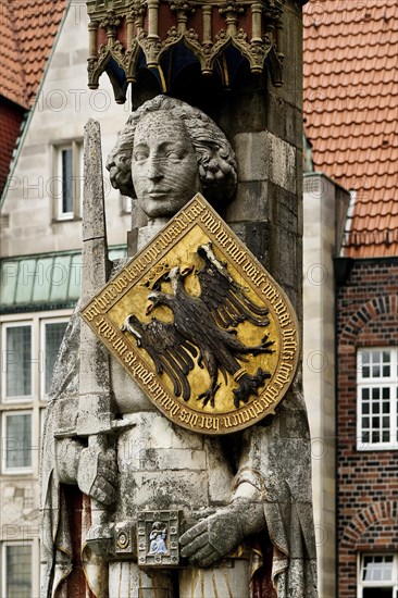 Bremen Roland in front of historic gabled houses