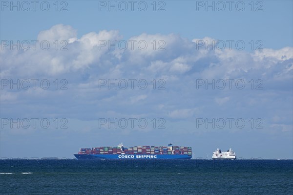 Container ship and ferry off Puttgarden