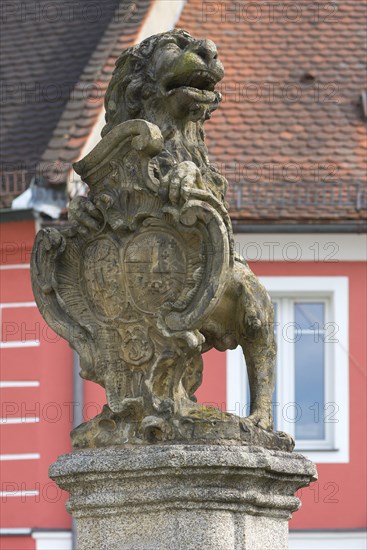 Lion with princely coat of arms as fountain figure on the Luitpoldplatz