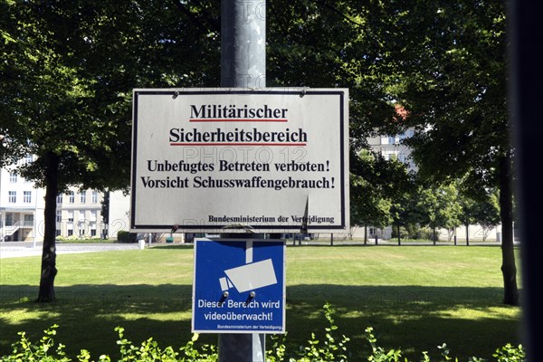 Warning sign with the inscription Militaerischer Sicherheitsbereich