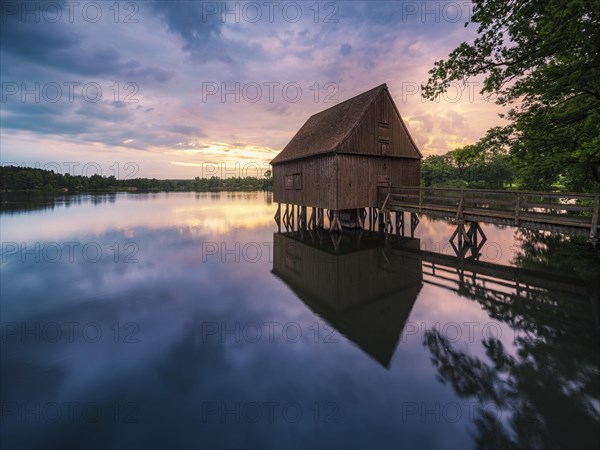 The pile house in the house pond at sunrise