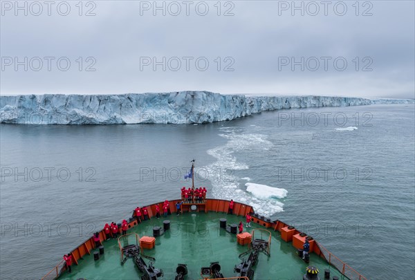 Icebreaker apporaching a massive glacier on Mc Clintok or Klintok Island