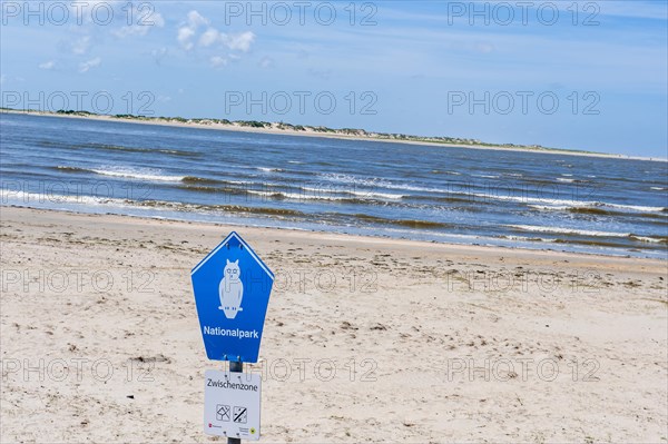 Information board on an intermediate zone of the Lower Saxony Wadden Sea National Park at the sandy beach near the harbour of the island of Baltrum