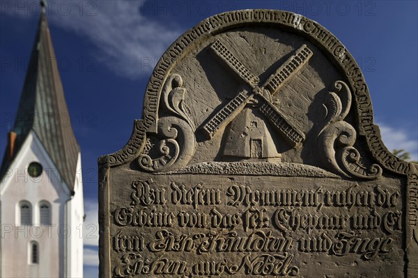 The speaking gravestone of the miller Erk Knudten at the cemetery in front of the St. Clemens church