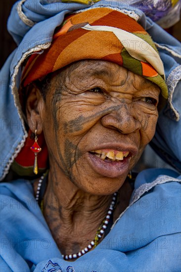 Woman with tattoors in her face